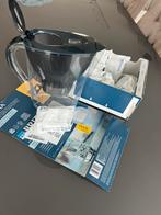 Carafe Brita et 9 filtres, Ophalen, Zo goed als nieuw