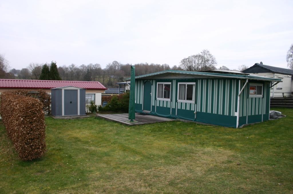 Caravan met voortent aan het meer van Roberville, Ringverwarming, Rondzit, Hobby, Queensbed