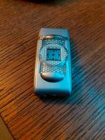 Aansteker met groene vlam, Enlèvement, Utilisé, Autres matériaux, Femme ou Homme