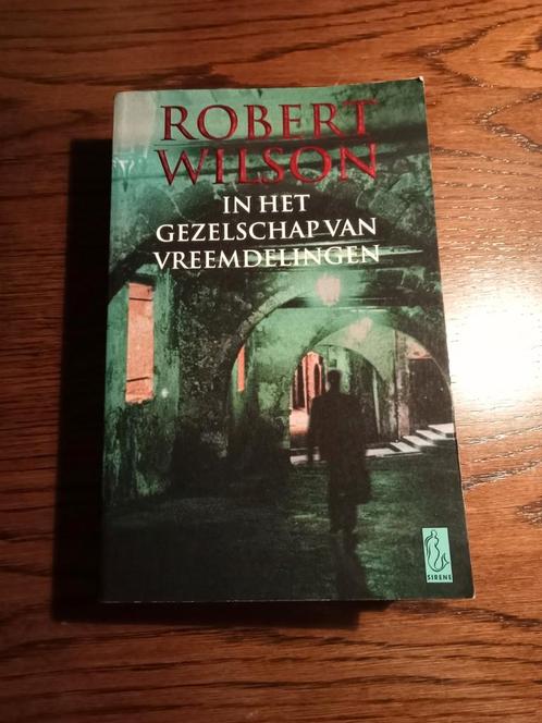 Robert Wilson: In het gezelschap van vreemdelingen, Boeken, Thrillers, Gelezen, Ophalen of Verzenden