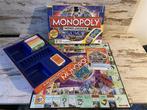Monopoly wereldeditie met onderhandelknop [s90], Ophalen of Verzenden, Zo goed als nieuw