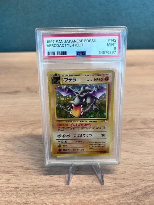 Aerodactyl Holo PSA 9 - #142 - Fossile japonais, Hobby & Loisirs créatifs, Jeux de cartes à collectionner | Pokémon, Comme neuf