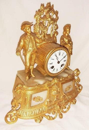 horloge de cheminée française ancienne Romance ad Mougin disponible aux enchères