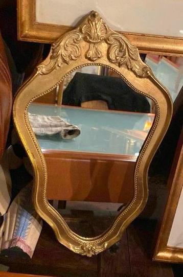 Miroir en bois doré style baroque 