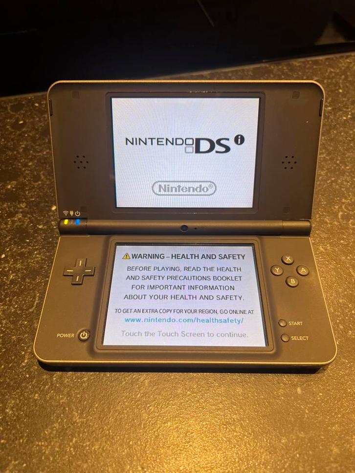 Nintendo DSi XL met 8 spelletjes, Games en Spelcomputers, Spelcomputers | Nintendo DS, Zo goed als nieuw, Dsi XL, Overige kleuren