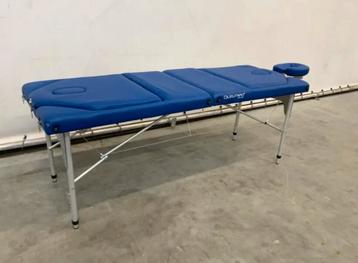 Opklapbare massage tafel beschikbaar voor biedingen