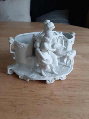 1 witte koekjesbak beschikbaar voor biedingen