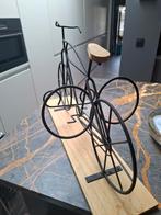 Opzet wijndrager fiets, Ophalen