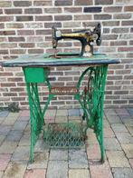 Singer naaimachine., Ophalen