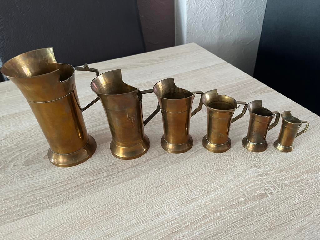 6 koperen kruiken. Afhaling in Brussel, Ophalen