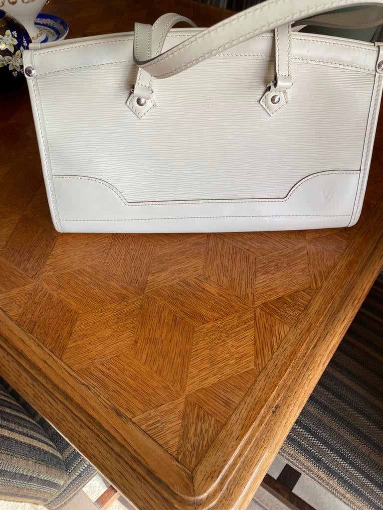 Louis Viton, Ophalen, Zo goed als nieuw