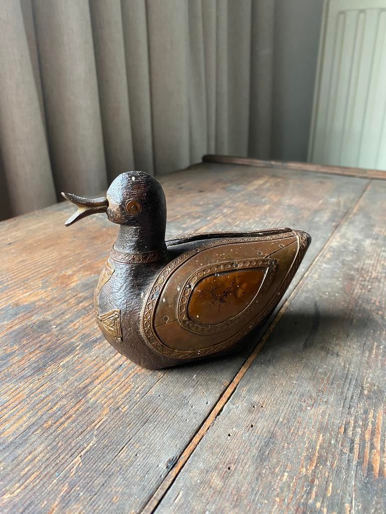 Houten eendje, Ophalen