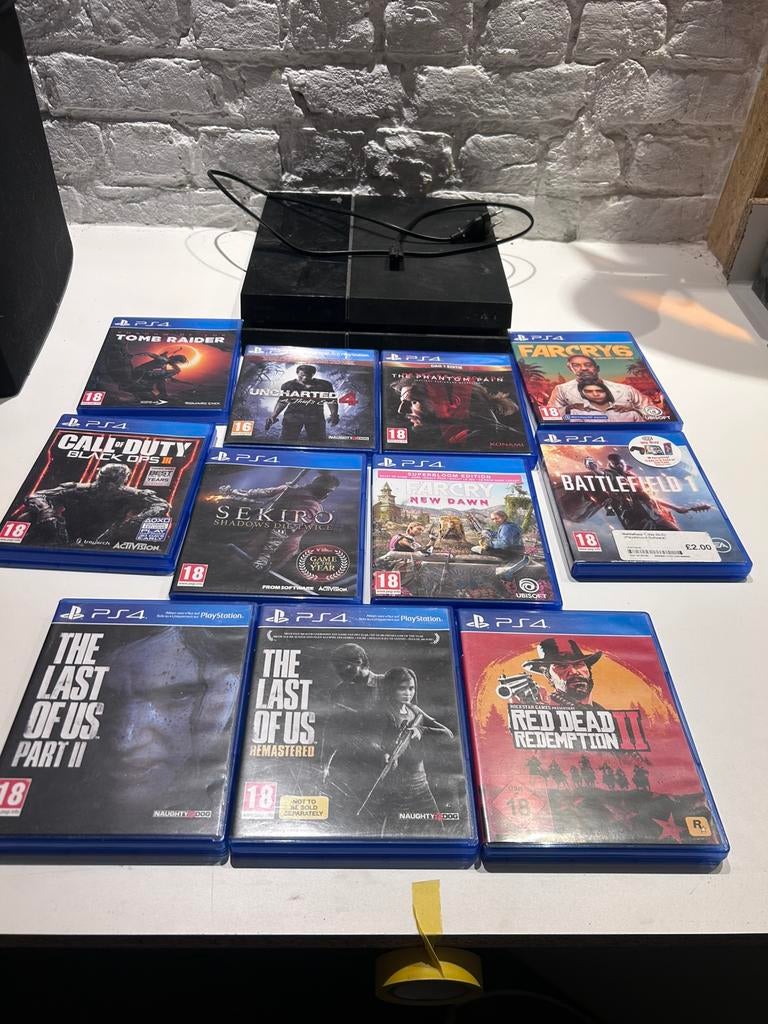 Playstation 4 met 11 games en 2 controllers, Consoles de jeu & Jeux vidéo, Consoles de jeu | Sony PlayStation 4, Enlèvement, Comme neuf