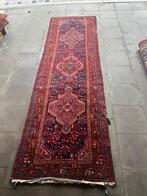 Mooi Perzisch tapijt, Ophalen