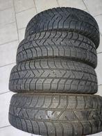 4 pneus hiver Pirelli 155/65 R14 avec enjoliveurs Toyota