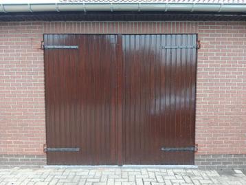 Houten garagepoort  beschikbaar voor biedingen