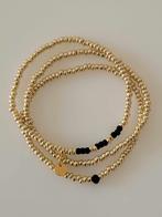 Armbandjes goud/zwart, Bijoux, Sacs & Beauté, Bracelets, Autres matériaux, Avec bracelets à breloques ou perles, Enlèvement ou Envoi