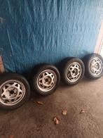 4 opel velgen met zeer goede banden 4x100, Auto-onderdelen, Banden en Velgen, Ophalen, Band(en)