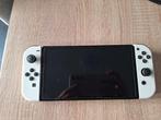 Nintendo Switch Oled met opbergcase en spelletje, Games en Spelcomputers, Spelcomputers | Nintendo Switch, Switch OLED, Met games