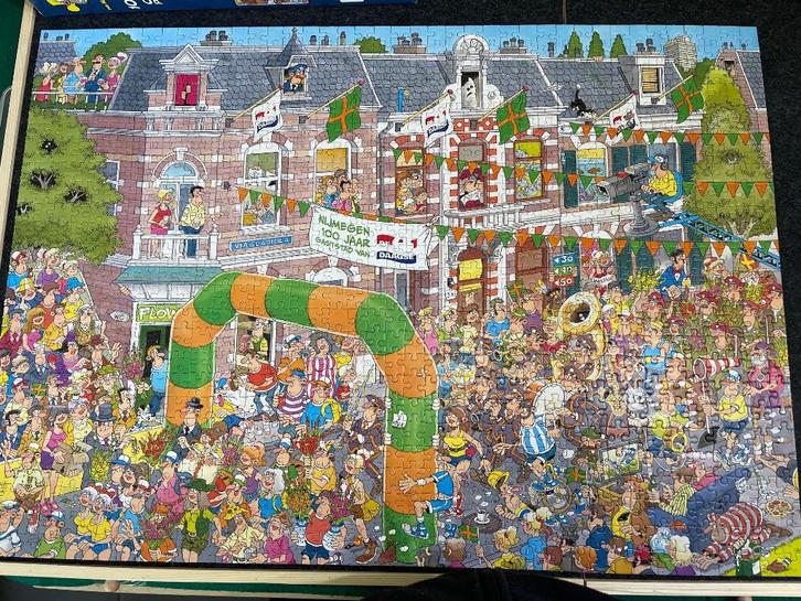 Puzzel Jan Van Haasteren - Nijmegen 100 jaar gaststad, Hobby en Vrije tijd, Denksport en Puzzels, Zo goed als nieuw, Legpuzzel