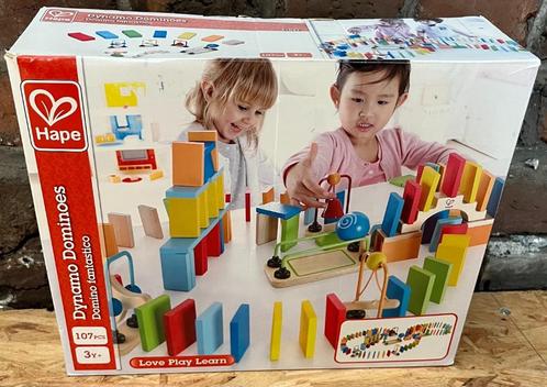 Spel - HAPE DYNAMO DOMINOS, Kinderen en Baby's, Speelgoed | Kinderpuzzels, Van hout, Ophalen of Verzenden