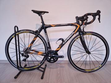 Vélo route Orbea Onyx carbone (Patins)