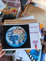 Leo verzamel mappen en dia's, Ophalen