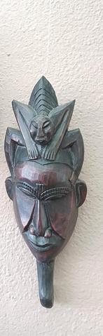 Afrikaans masker, Ophalen