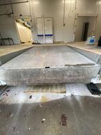 Dock leveler laadkade brug, Ophalen