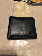 Leren portefeuille, Enlèvement