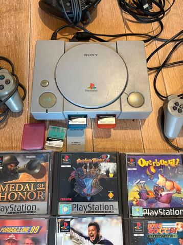 PlayStation 1 met tal van spelletjes  beschikbaar voor biedingen