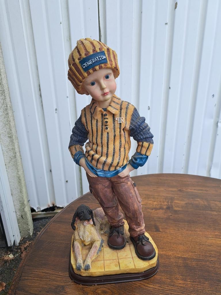 Beeldje jongen met hond, Ophalen