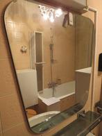 Badkamerspiegel, Ophalen