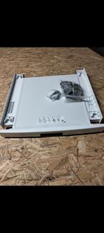 Stapelaar wasmachine droogkast, Ophalen