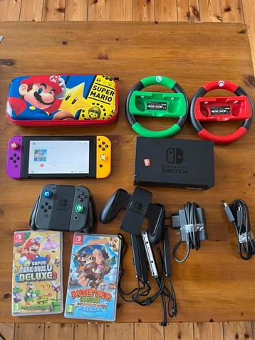 Nintendo Switch + Joy-Con + Support officiel + 2 jeux + Hori beschikbaar voor biedingen