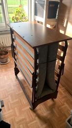 Opvouwbed met wieltjes onder, Ophalen