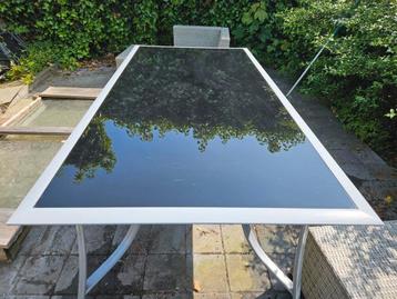 Glazen tuintafel 200/100cm met 5 stoelen beschikbaar voor biedingen