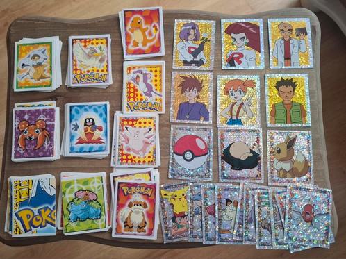 Genre: Panini Merlin pokemon 143 verschillende afbeeldingen, Hobby en Vrije tijd, Stickers en Plaatjes, Gebruikt, Ophalen of Verzenden