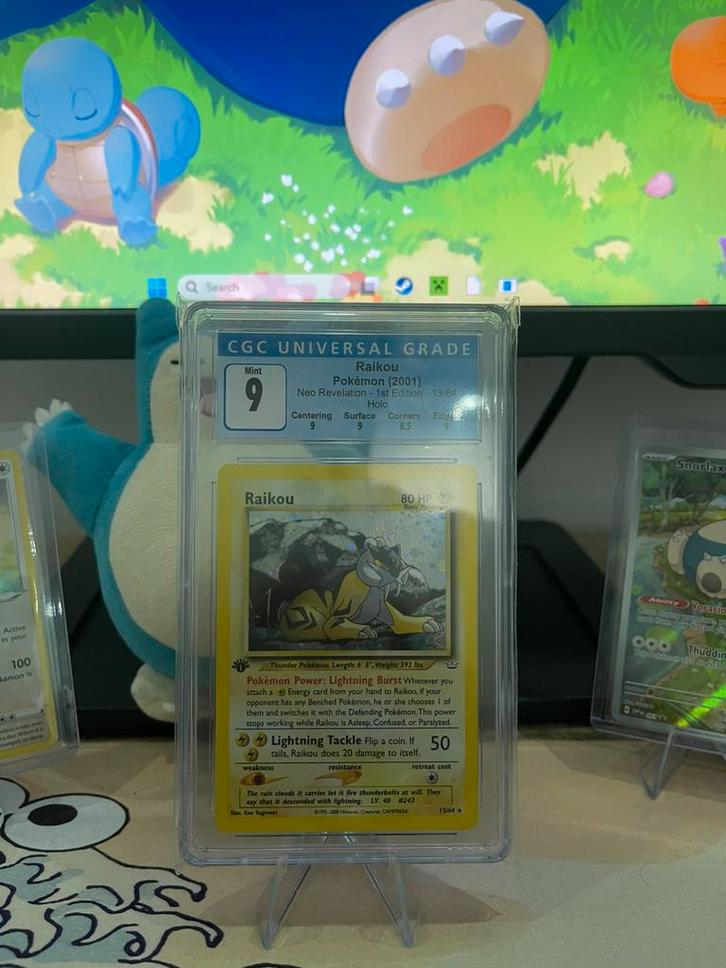 Pokémon Raikou 13/64 – 1st Edition – Holo – CGC 9, Hobby en Vrije tijd, Verzamelkaartspellen | Pokémon, Losse kaart, Ophalen of Verzenden