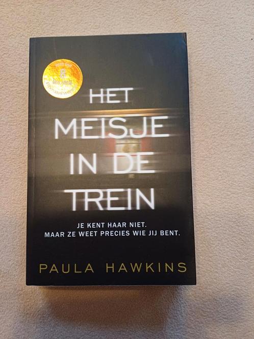 Paula Hawkins - Het meisje in de trein, Boeken, Thrillers, Zo goed als nieuw, Ophalen of Verzenden