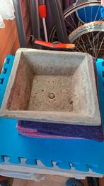 Bloempot in cement, Ophalen