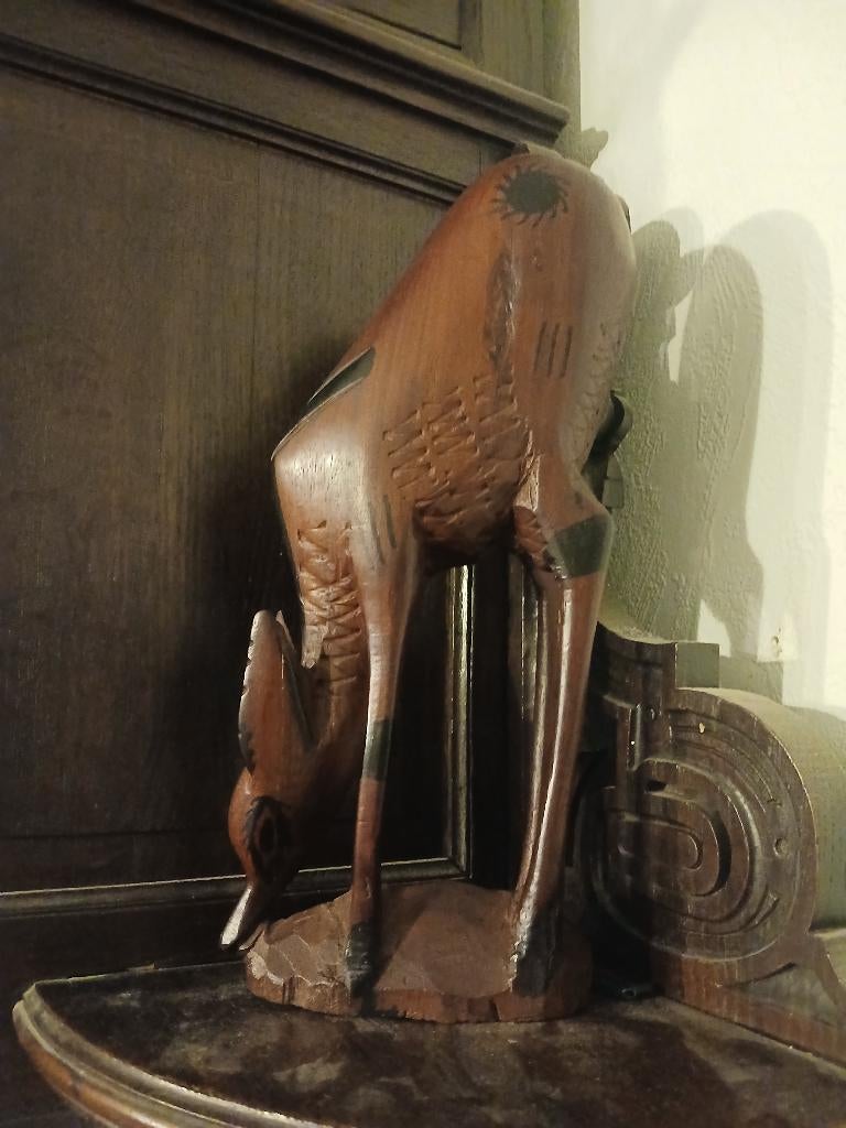 Houten beeld, Ophalen