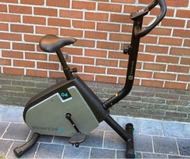 Hometrainer domyos essential, Sports & Fitness, Appareils de fitness, Jambes, Comme neuf, Enlèvement, Vélo d'appartement