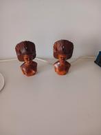 2 houten beelden, Ophalen