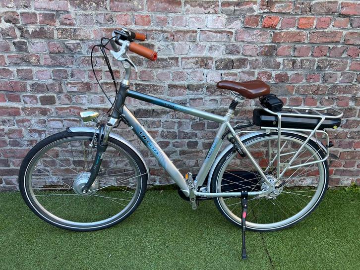 Elektrische heren fiets in top staat, Fietsen en Brommers, Fietsen | Heren | Herenfietsen, Zo goed als nieuw, Versnellingen, Ophalen