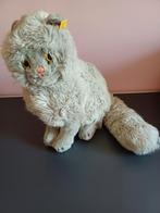 Mooie grijze kat van Steiff met knopje en vaantje, Antiek en Kunst, Ophalen