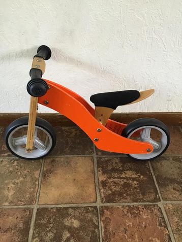 Houten loopfietsje beschikbaar voor biedingen
