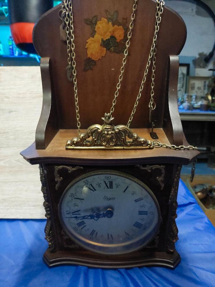 Urgos wandklok slinger - mechanisch, met kettingen, Antiek en Kunst, Antiek | Klokken, Ophalen