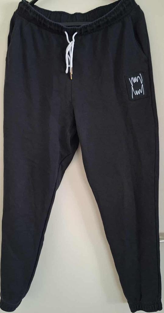 Trainingsbroek van Puma. Maat L, Kleding | Heren, Sportkleding, Zo goed als nieuw, Algemeen, Maat 52/54 (L), Zwart, Verzenden