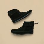 Nieuwe Minnetonka-laarzen, Ophalen